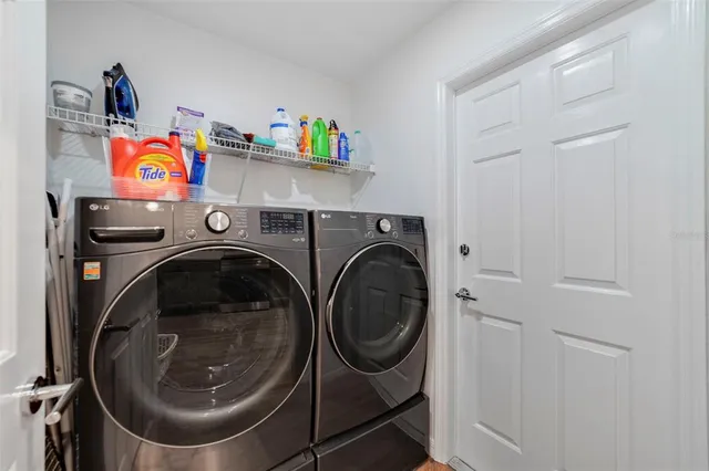 a utility room with dryer and washer