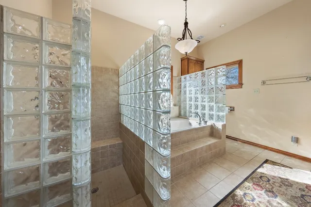 a large kitchen with stainless steel appliances granite countertop a large counter top and stove