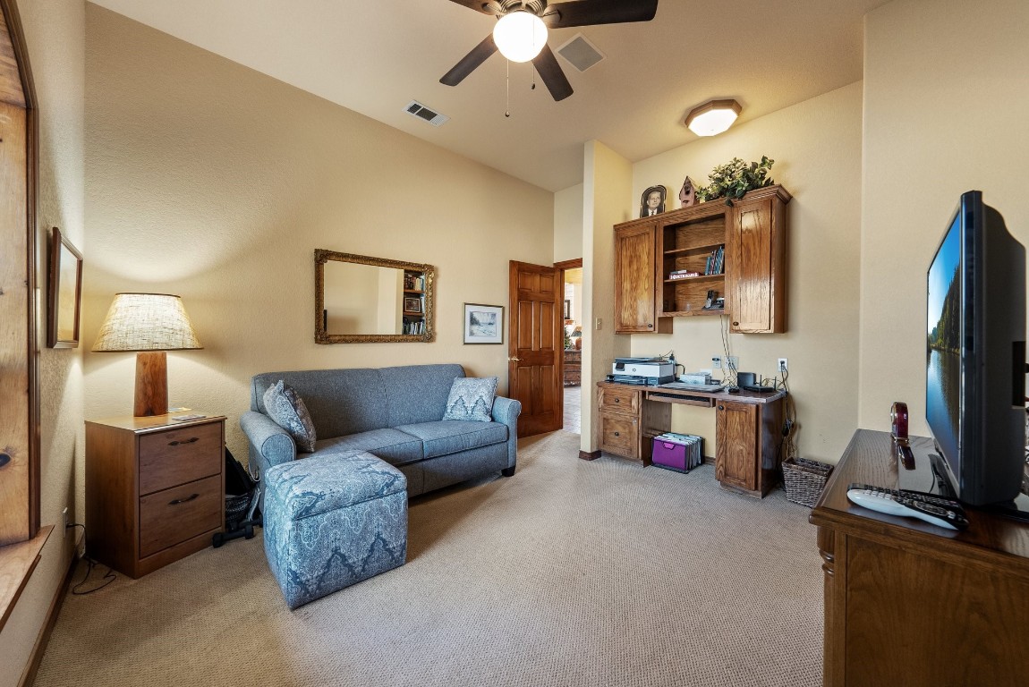 8095 Ranch To Market Road 2618 Fredonia, TX 76842 - Photo 3 of 39 a living room with furniture and a flat screen tv