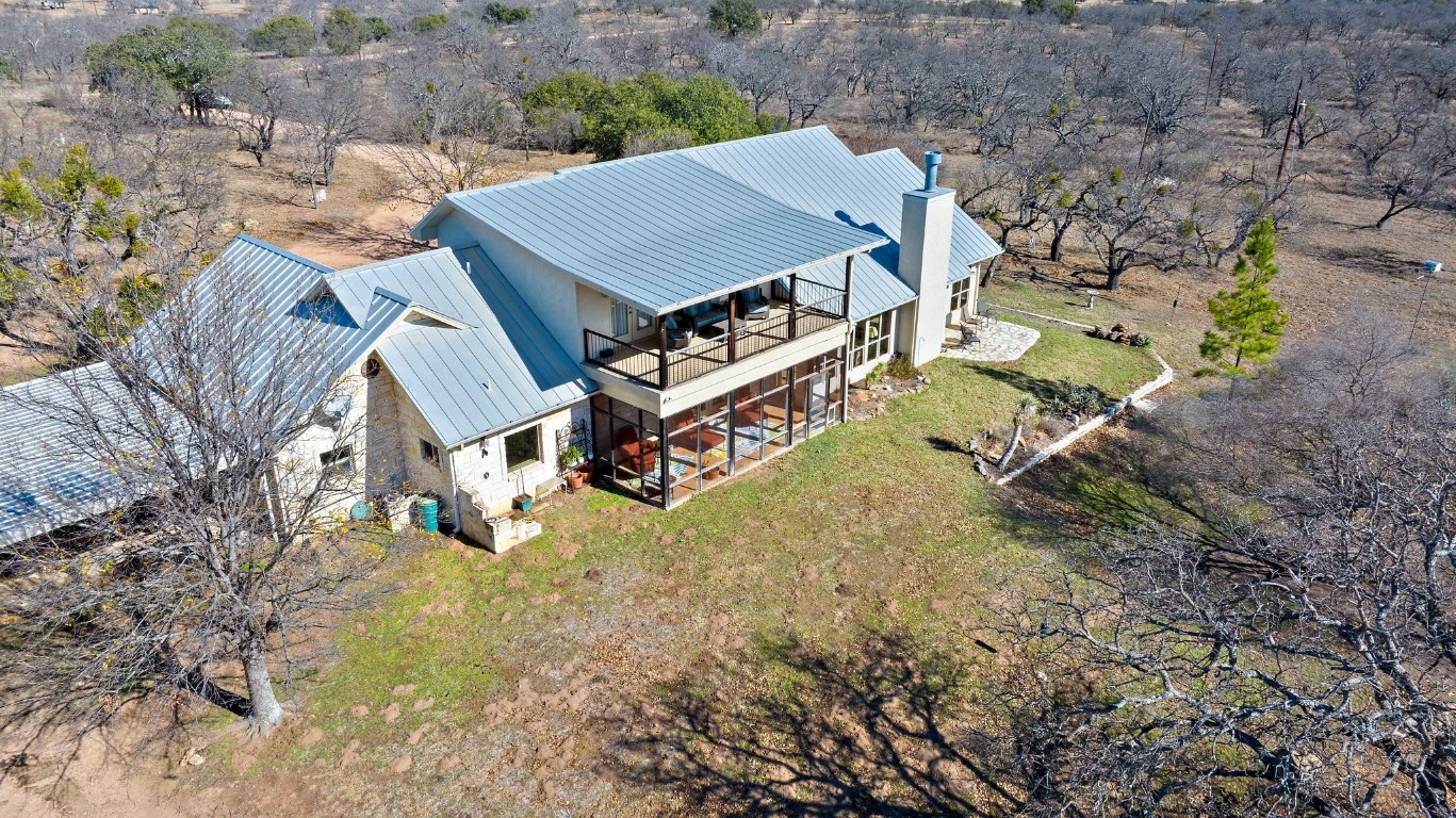 8095 Ranch To Market Road 2618 Fredonia, TX 76842 - Photo 33 of 39 an aerial view of a house with yard and trees