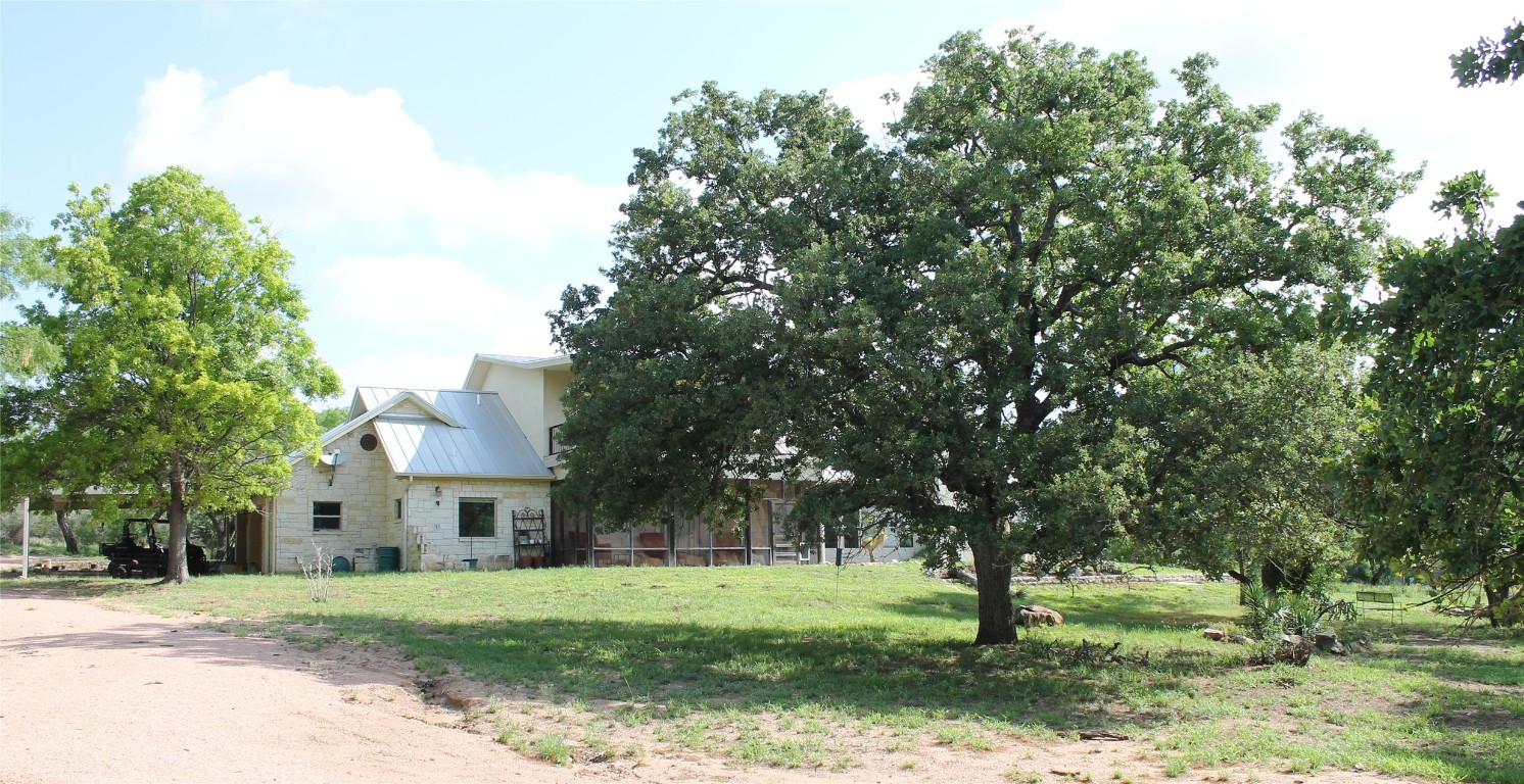8095 Ranch To Market Road 2618 Fredonia, TX 76842 - Photo 37 of 39 a front view of a house with a yard