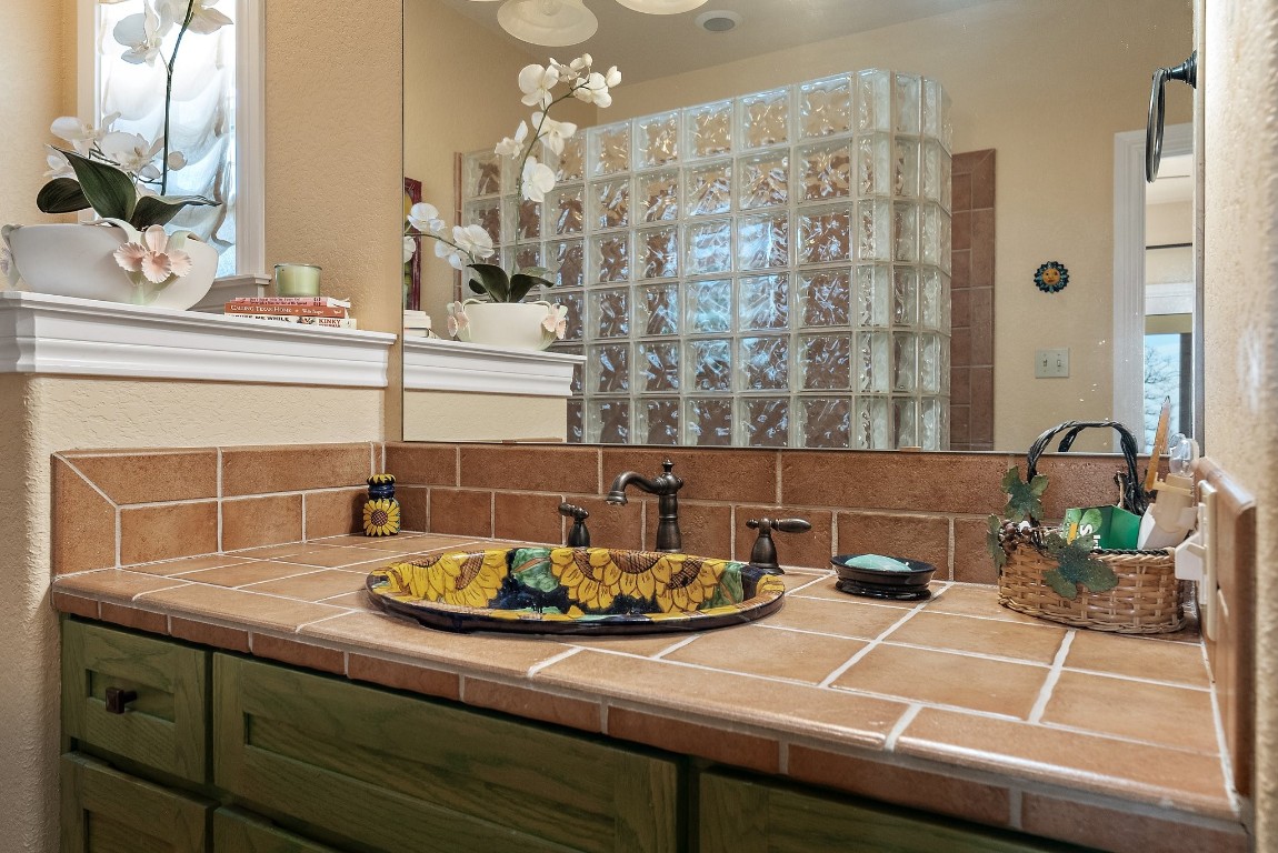 8095 Ranch To Market Road 2618 Fredonia, TX 76842 - Photo 4 of 39 a bathroom with a sink and a mirror