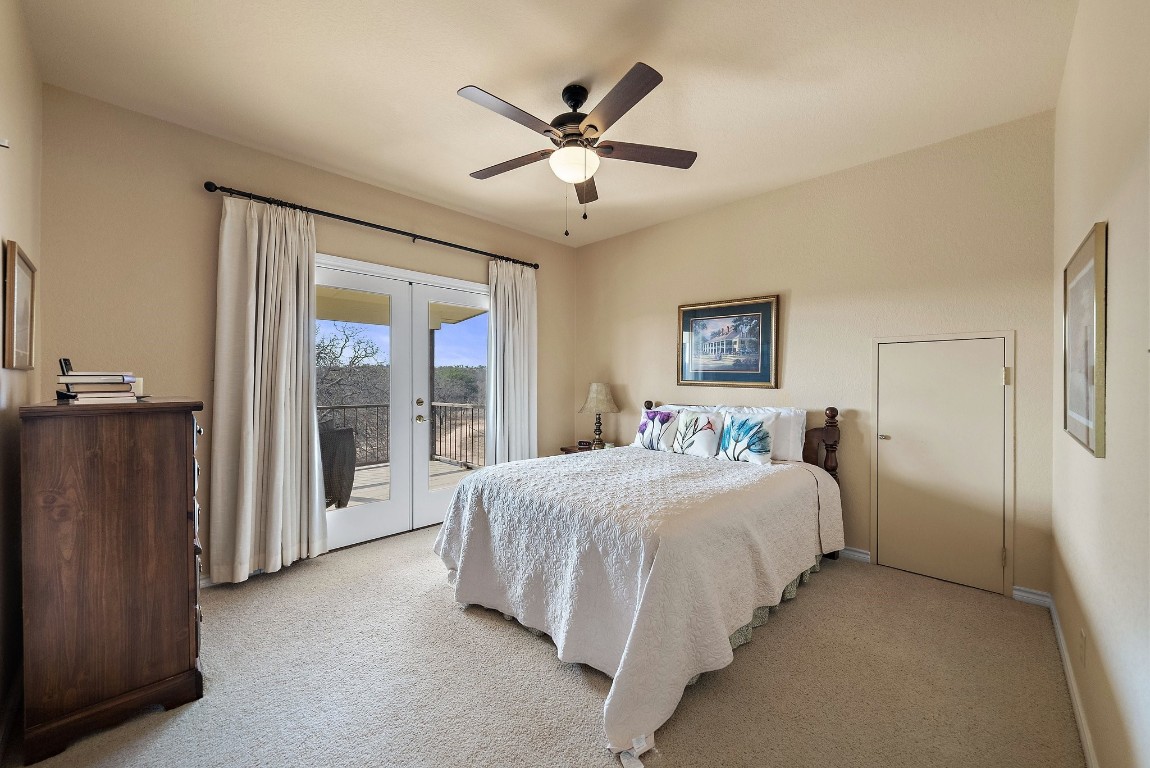 8095 Ranch To Market Road 2618 Fredonia, TX 76842 - Photo 8 of 39 a bedroom with a bed and a large window