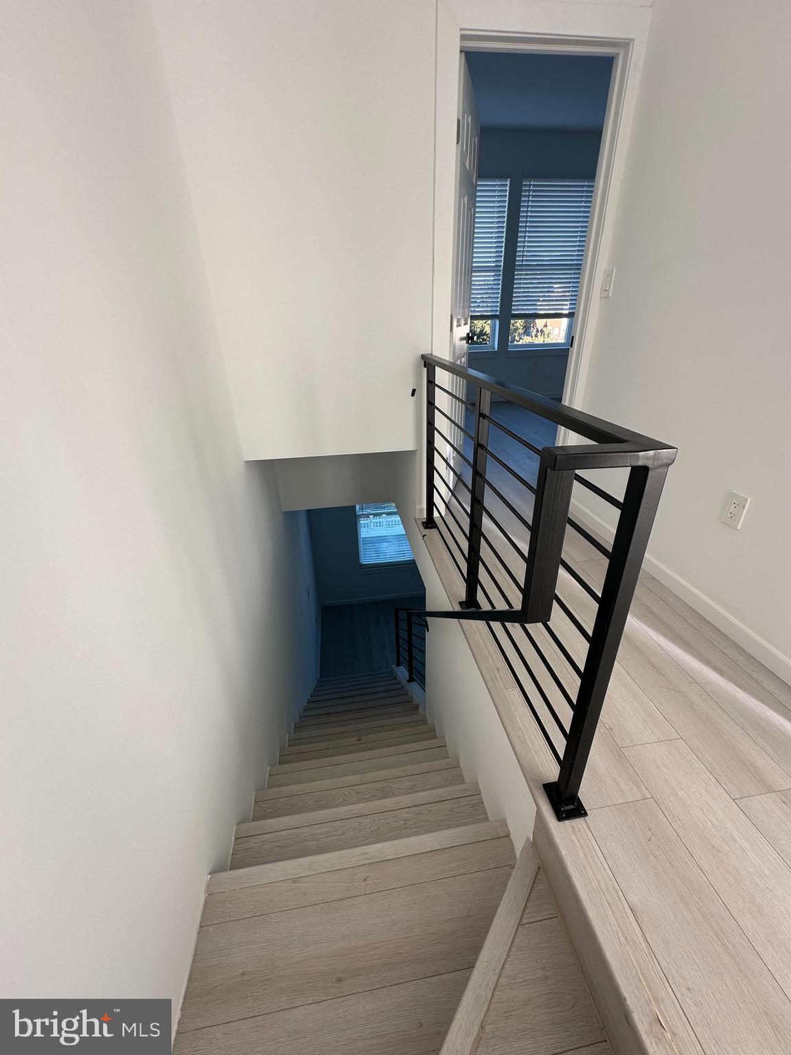 1925 H Street Northeast, Unit 3 Washington, DC 20002 - Photo 12 of 33 a view of entryway and hall with wooden floor