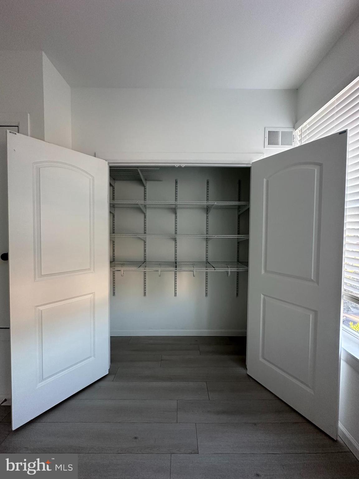 1925 H Street Northeast, Unit 3 Washington, DC 20002 - Photo 16 of 33 a view of an empty room