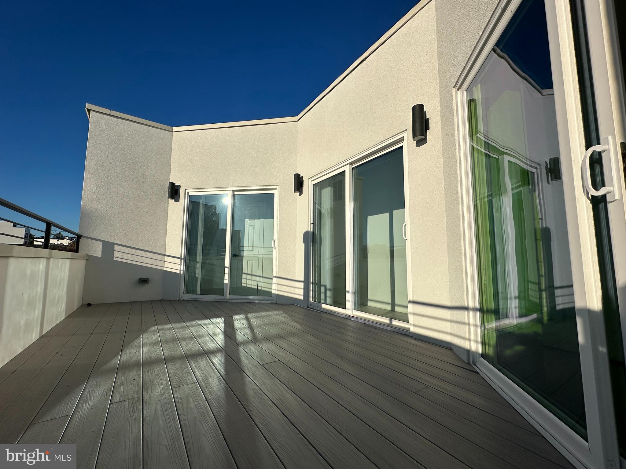 1925 H Street Northeast, Unit 3 Washington, DC 20002 - Photo 22 of 33 a view of a house with wooden floor