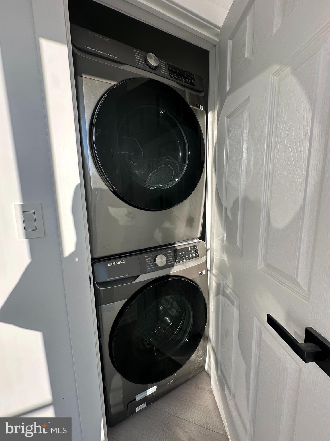 1925 H Street Northeast, Unit 3 Washington, DC 20002 - Photo 26 of 33 a close up view of a washer and dryer