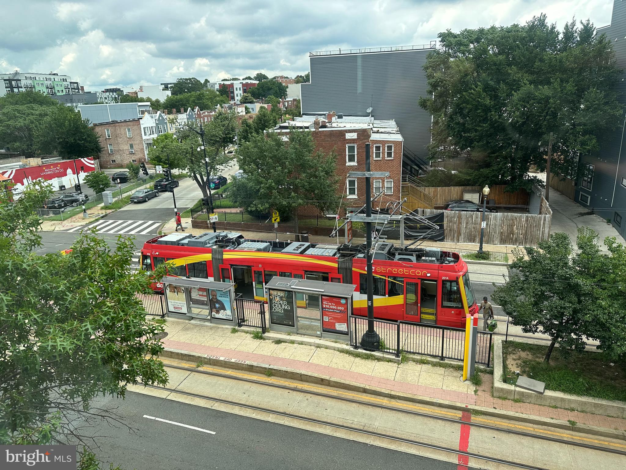1925 H Street Northeast, Unit 3 Washington, DC 20002 - Photo 32 of 33 a childrens park with multi story houses