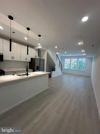 a childrens park with multi story houses