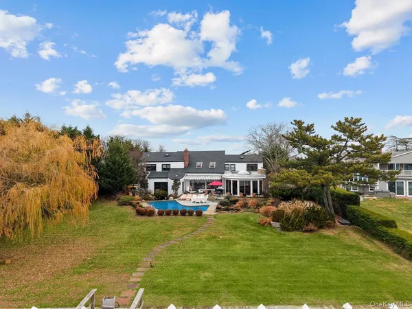 a view of a house with a big yard