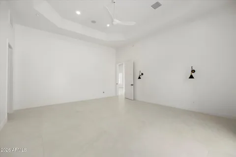 a bathroom with a double vanity sink mirror and toilet