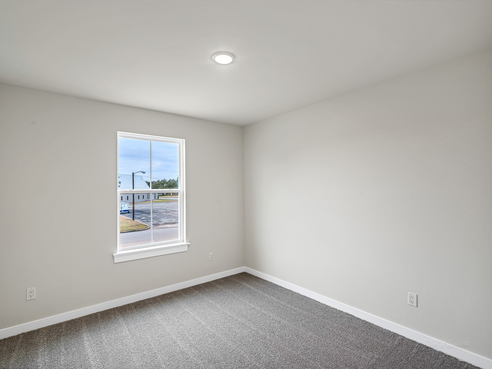 1006 4th Street Hempstead, TX 77445 - Photo 18 of 29 an empty room with windows