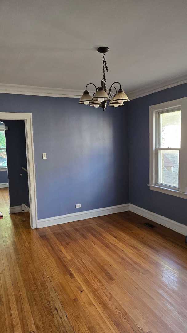 9417 South Racine Avenue Chicago, IL 60620 - Photo 6 of 9 a view of a room with gym equipment