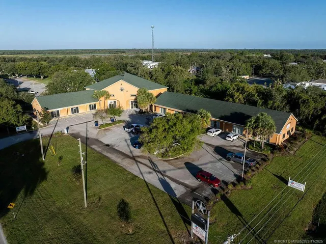 an aerial view of a house with a garden