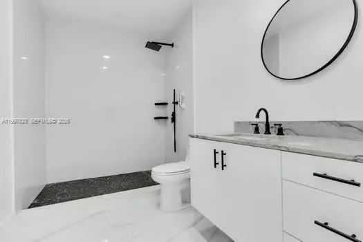 a view of a backyard with a garden