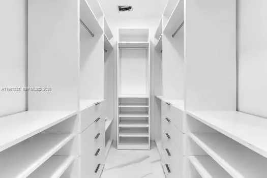 a view of a chair and table in the yard