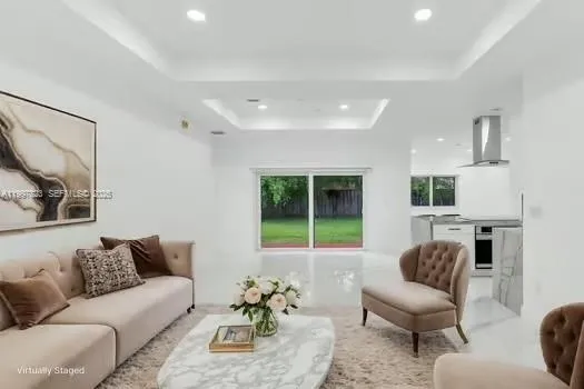 a view of kitchen with furniture and large window