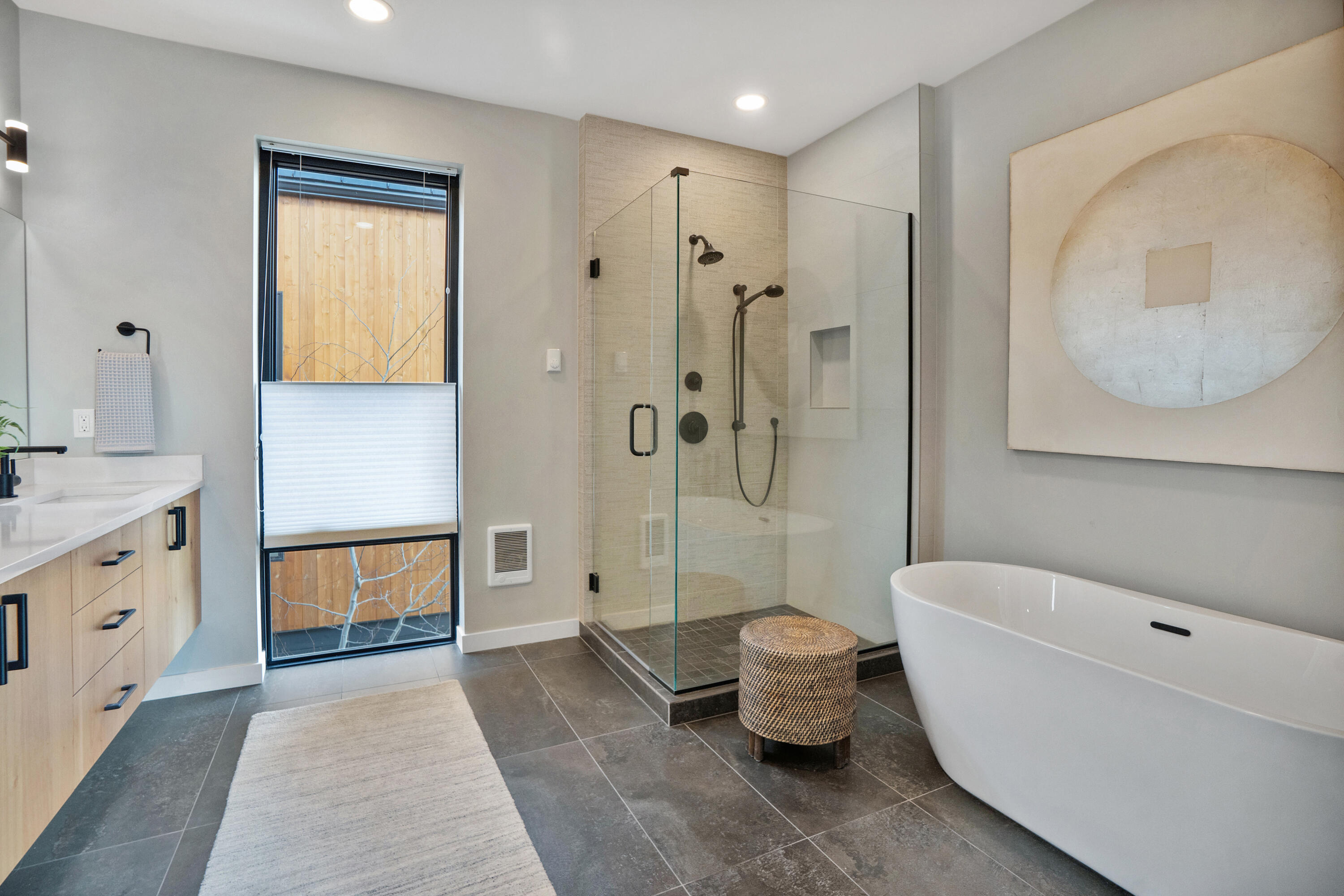 61250 Meeks Trail Bend, OR 97702 - Photo 27 of 43 a spacious bathroom with a bathtub shower sink and toilet