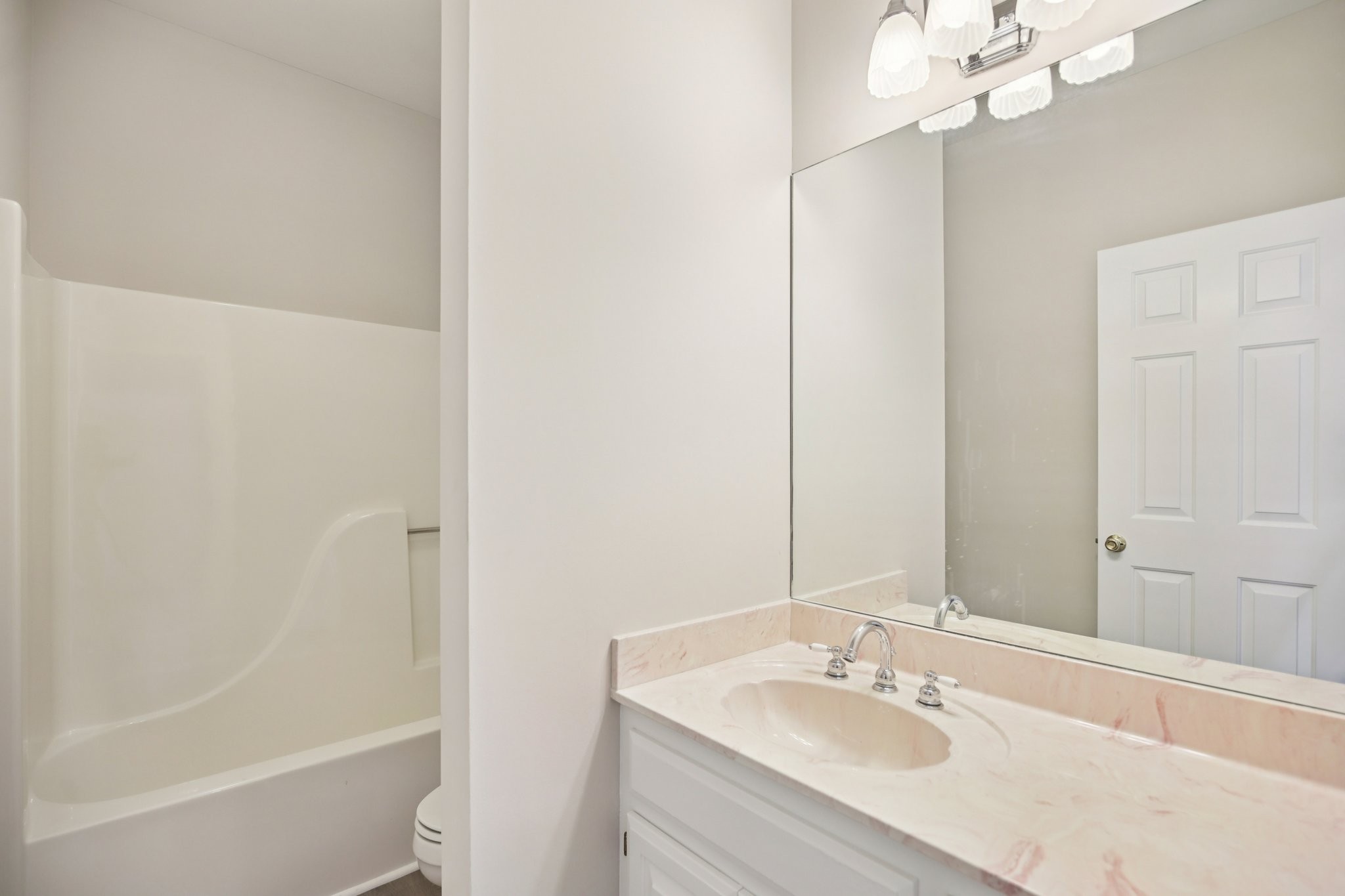 4026 Windland Drive Springfield, TN 37172 - Photo 7 of 32 a bathroom with a sink a toilet and shower