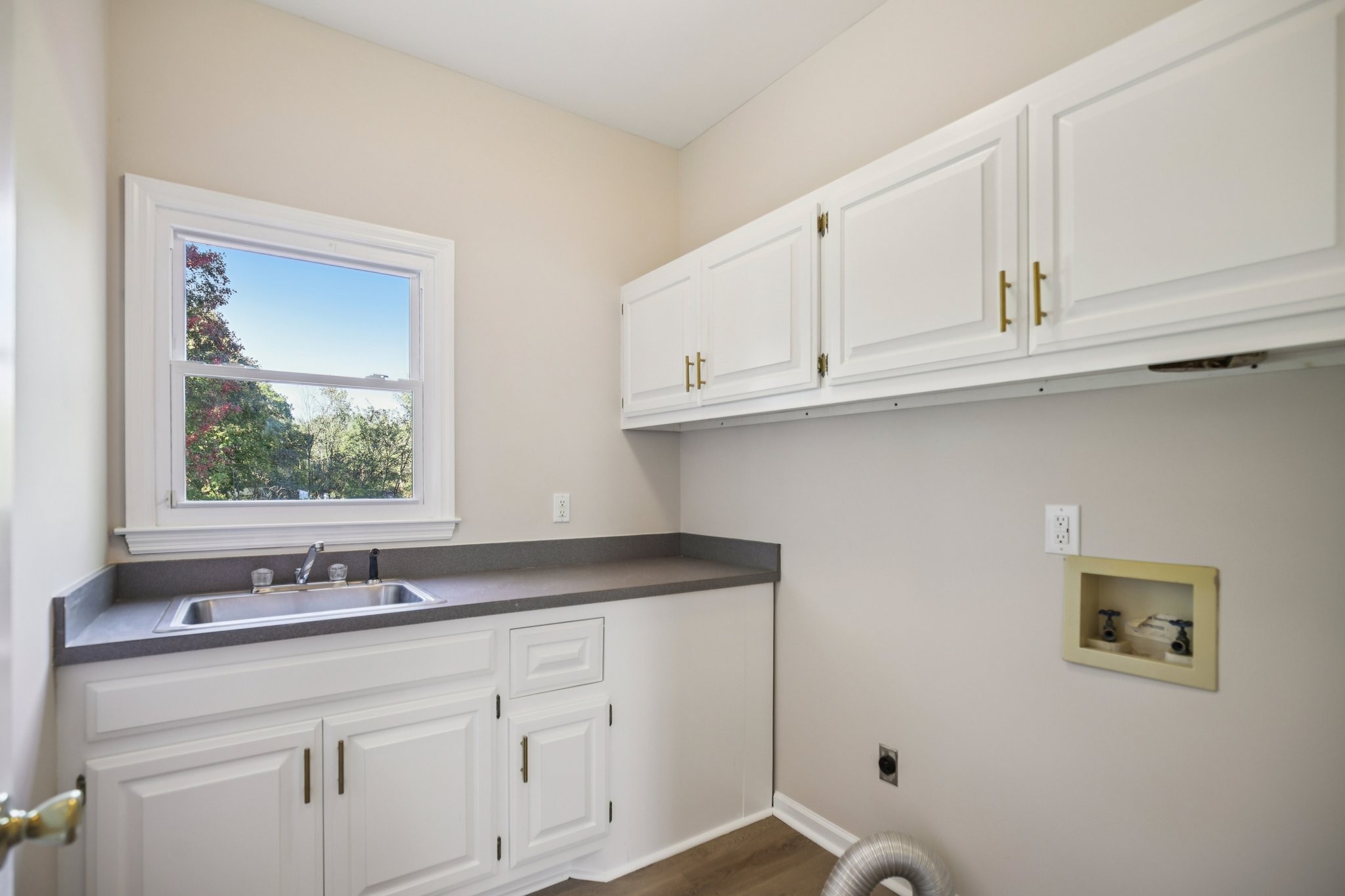 4026 Windland Drive Springfield, TN 37172 - Photo 9 of 32 a sink with white cabinets