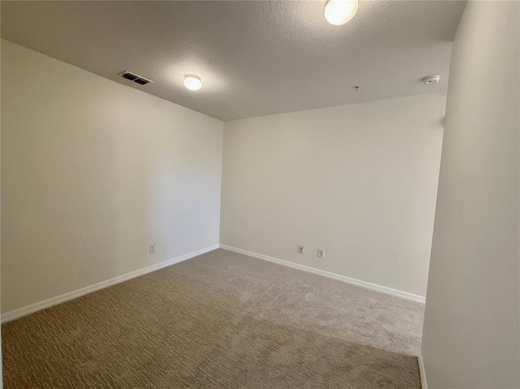 2090 Water Tupelo Way Ocoee, FL 34761 - Photo 13 of 43 a view of an empty room