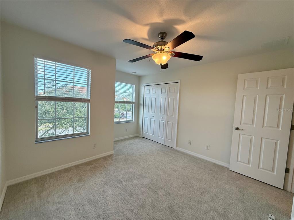 2090 Water Tupelo Way Ocoee, FL 34761 - Photo 18 of 43 a view of an empty room with a window