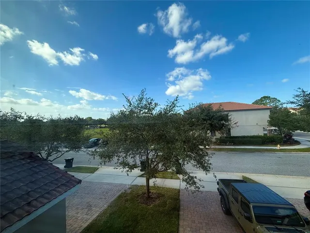 a view of a yard with patio