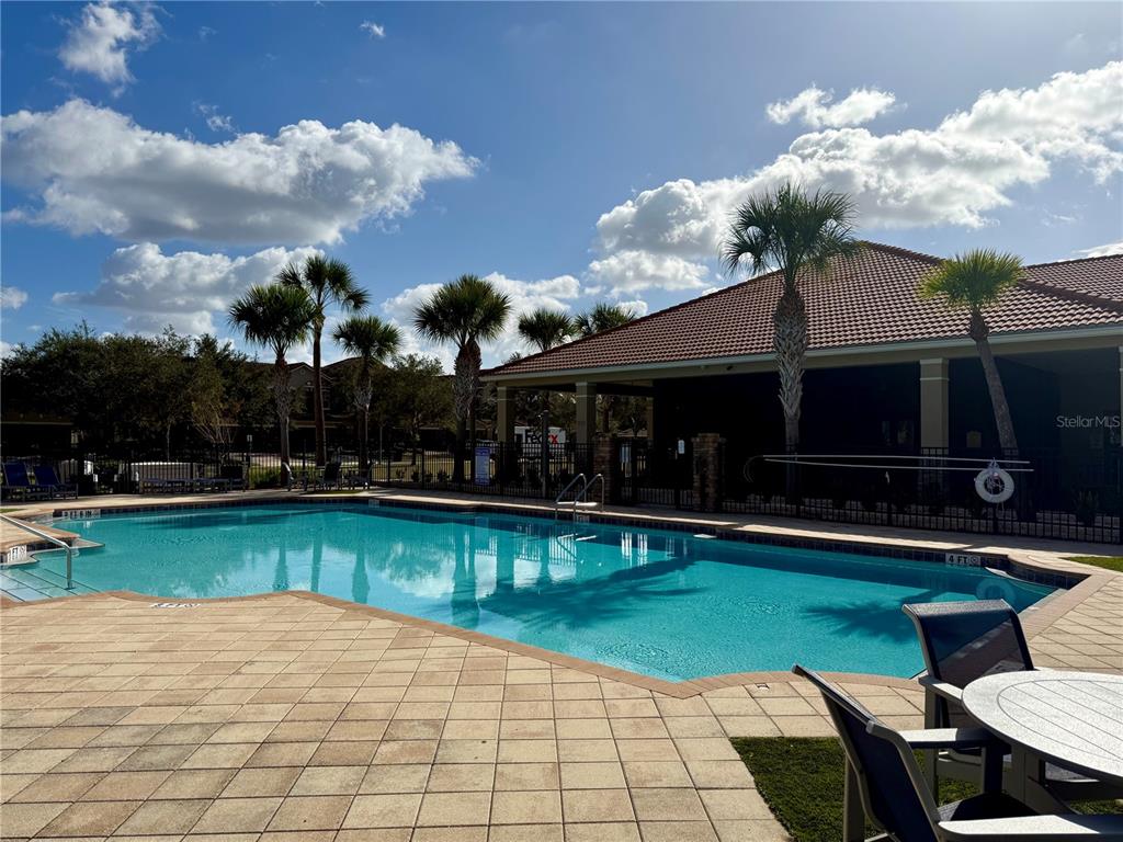 2090 Water Tupelo Way Ocoee, FL 34761 - Photo 35 of 43 a front view of house with yard and outdoor seating