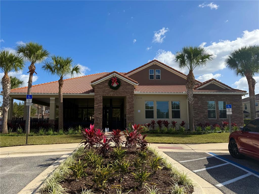 2090 Water Tupelo Way Ocoee, FL 34761 - Photo 37 of 43 a front view of a house with a yard