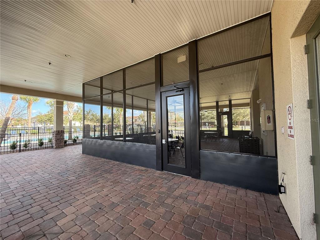 2090 Water Tupelo Way Ocoee, FL 34761 - Photo 38 of 43 a large bedroom with a large window and bed