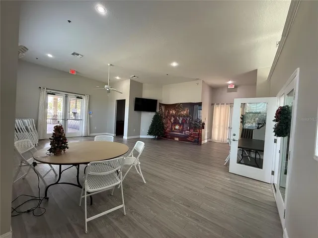 a kitchen with a sink and a refrigerator