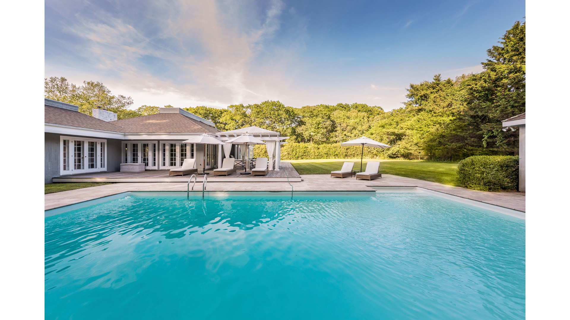 5 Ranch Court Sagaponack, NY 11962 - Photo 27 of 30 a view of a house with swimming pool and a yard