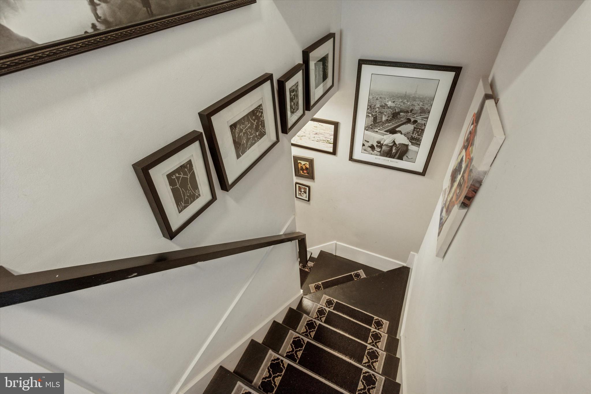520 Homewood Avenue Narberth, PA 19072 - Photo 20 of 25 a view of staircase with white walls and a window