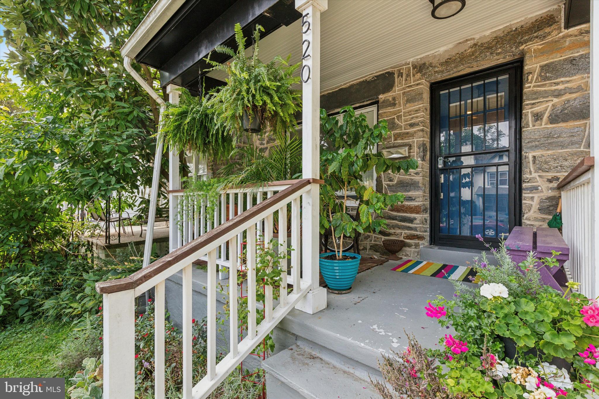 520 Homewood Avenue Narberth, PA 19072 - Photo 2 of 25 a view of flower garden in front of a building