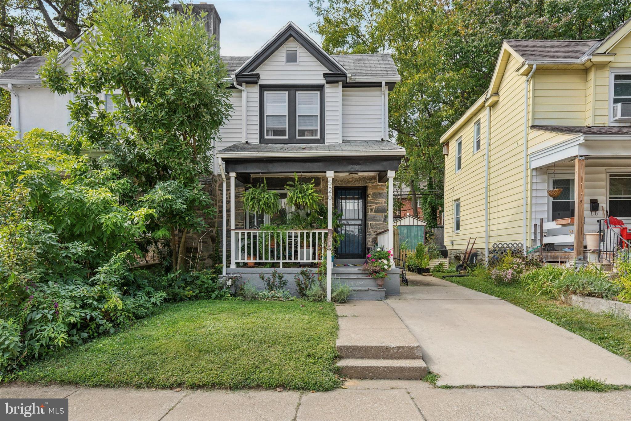 520 Homewood Avenue Narberth, PA 19072 - Photo 25 of 25 a view of a house with a small yard plants and large tree