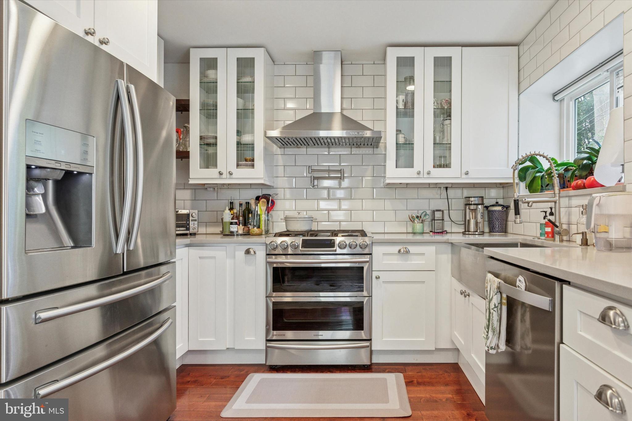 520 Homewood Avenue Narberth, PA 19072 - Photo 7 of 25 a kitchen with a refrigerator stove and sink