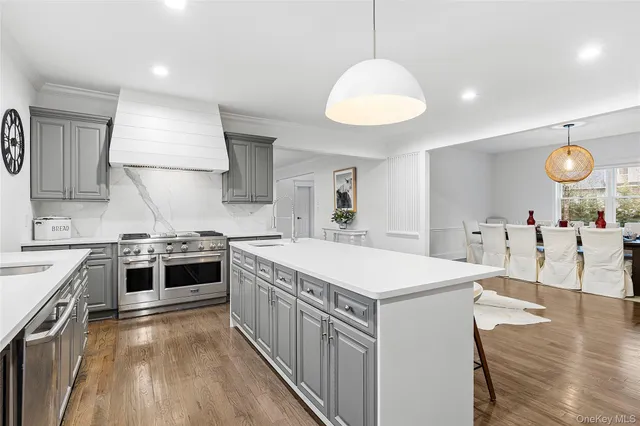 a kitchen with a stove and a table
