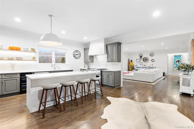 a large kitchen with a table and chairs