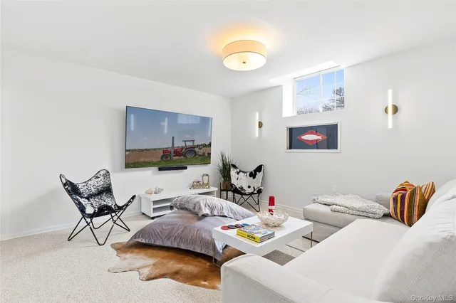 a living room with furniture and a couch