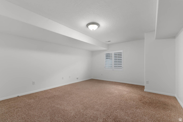 439 East 13540 South Draper, UT 84020 - Photo 33 of 46 Spacious room featuring neutral carpeting and white walls