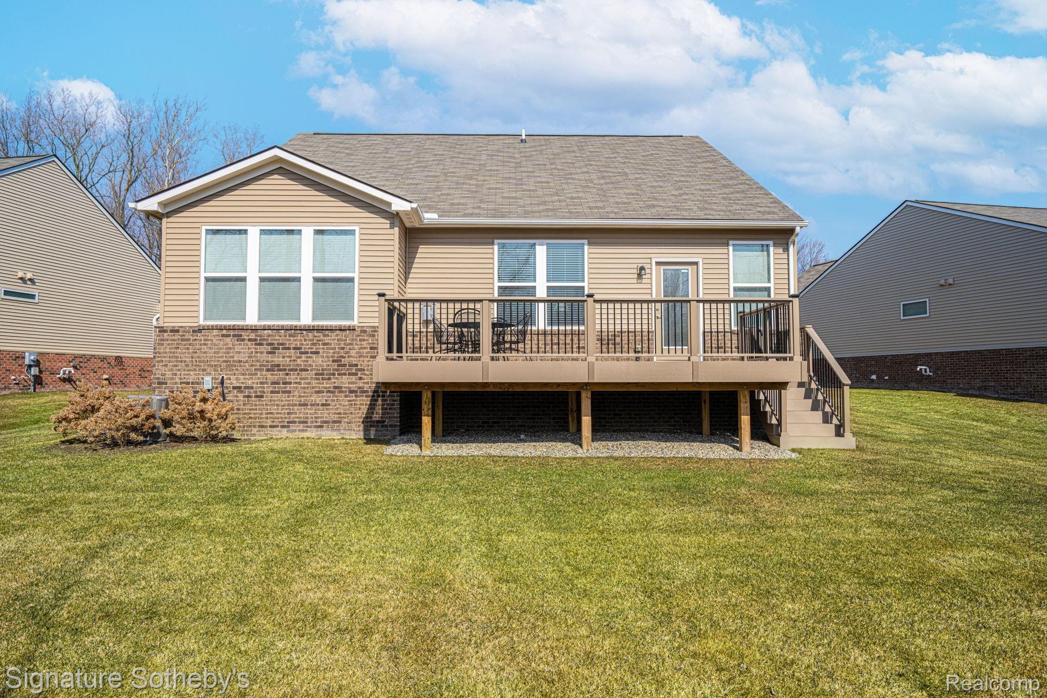 49583 Mapleton Road Canton, MI 48188 - Photo 35 of 46 REAR EXTERIOR - LARGE COMPOSITE DECK WITH STAIRCASE