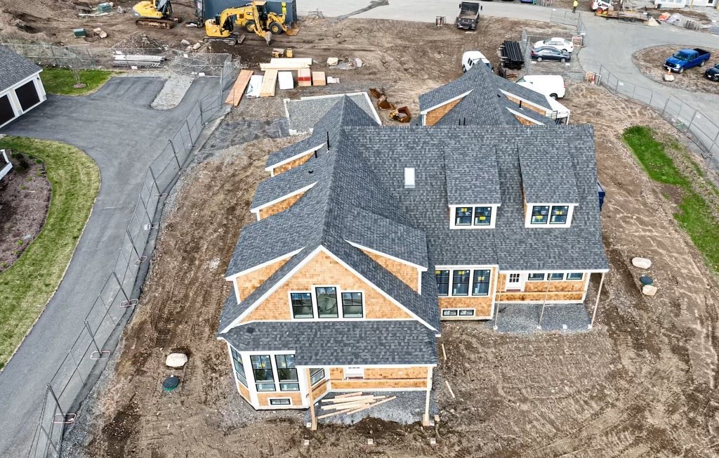 165 Atlantic Road, Unit 1 Gloucester, MA 01930 - Photo 2 of 17 an aerial view of a house with a yard