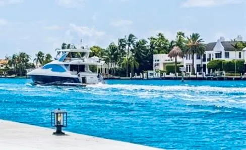 a house view with swimming pool garden and bench