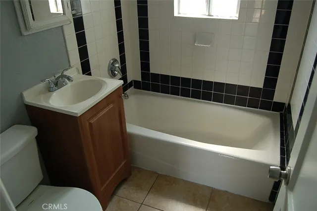 a bathroom with a sink and a bathtub