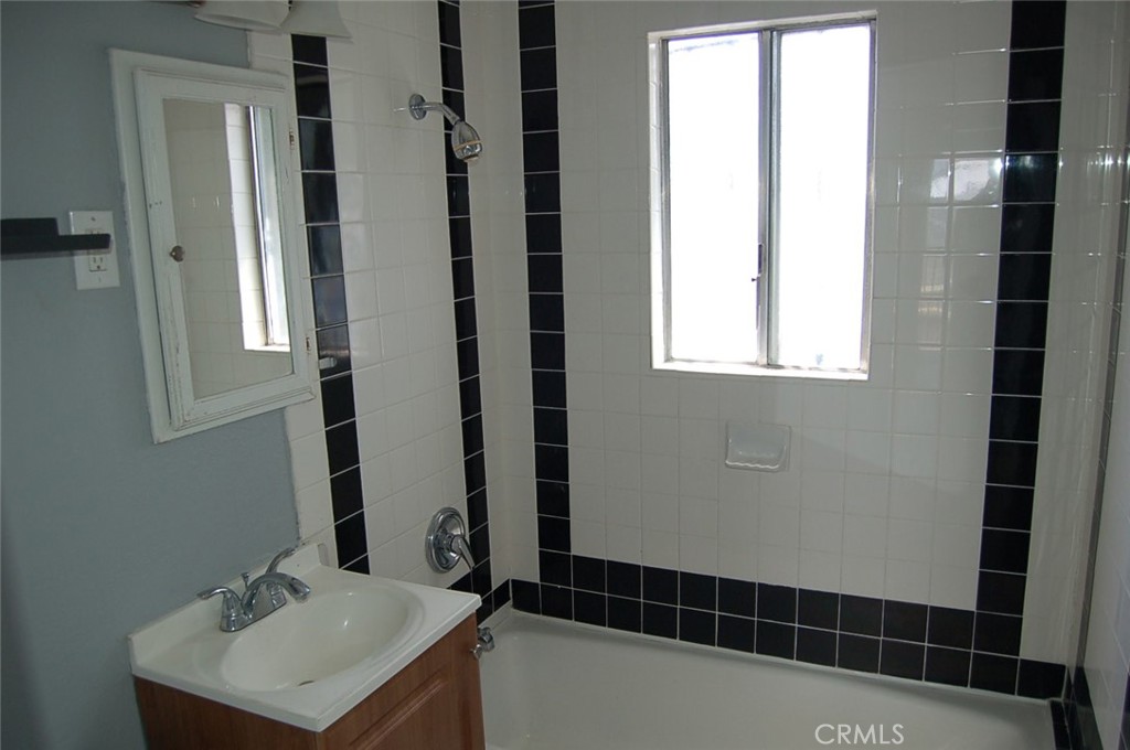 422 West Palm Street, Unit 424 1/2D Compton, CA 90220 - Photo 10 of 17 a bathroom with a sink toilet and shower