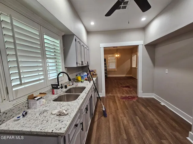 a view of a house with a street