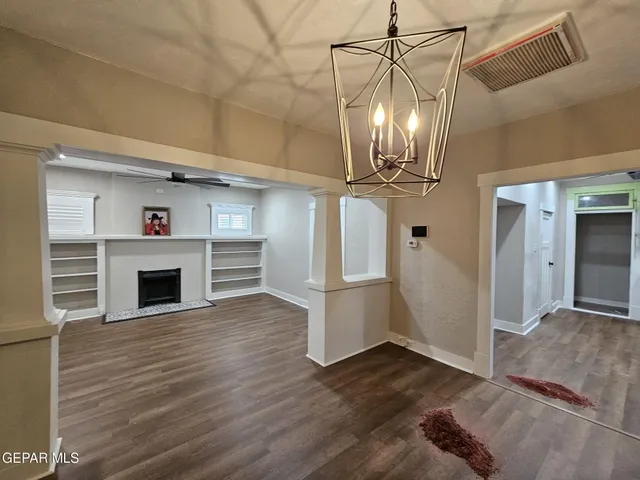 a kitchen with stainless steel appliances granite countertop a stove and a sink