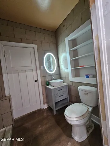 a kitchen with stainless steel appliances granite countertop a stove and a sink
