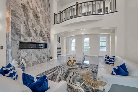 a view of a porch with wooden floor and windows