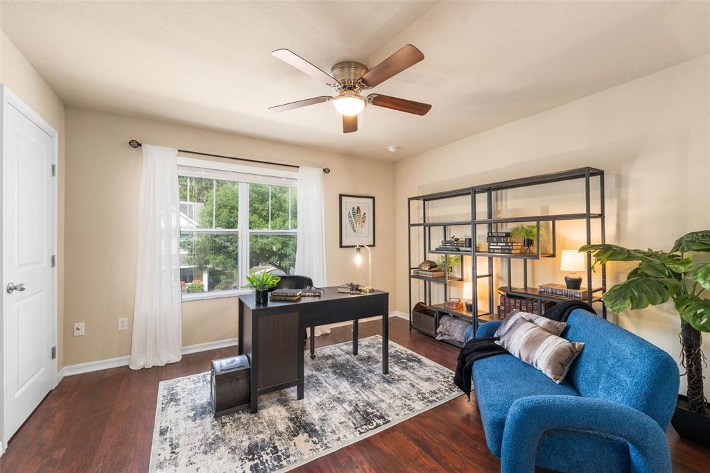 4639 Southwest 48th Drive, Unit 151 Gainesville, FL 32608 - Photo 11 of 26 a living room with furniture and a window